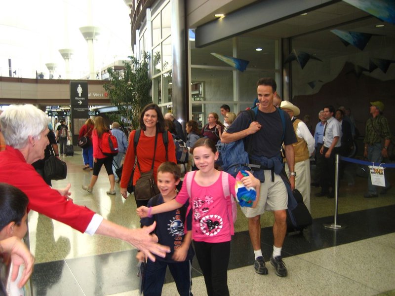 Shannon's family welcoming us home at Denver International Airport. 