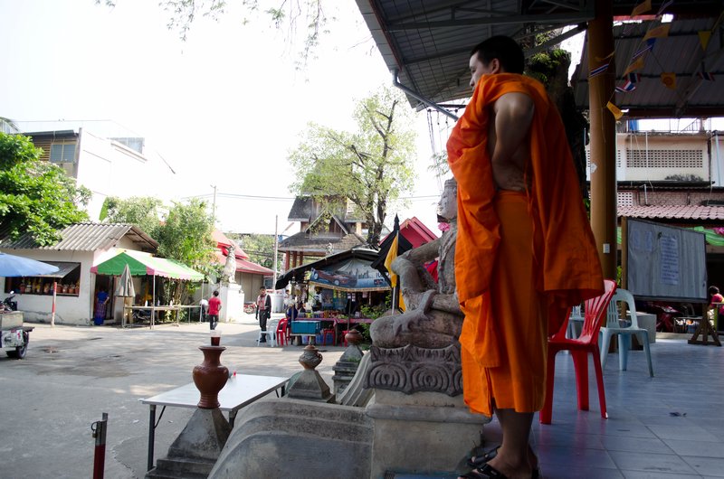 Senior Monk Taking a Breather After it its Over
