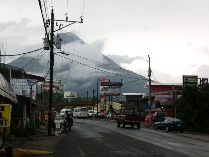 The town with the volcano as a back drop
