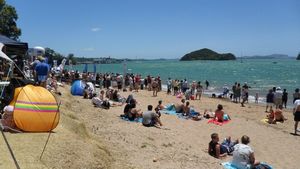 Busy beach on a beautiful day in Paihia
