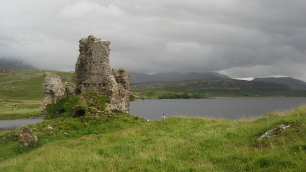 Ardvreck Castle and the brooding clouds behind