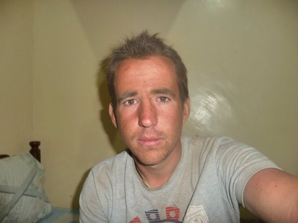Me. After 8 hours on the truck. Half sunburn, half dust. And the look in my eyes? It's the look of a broken man.