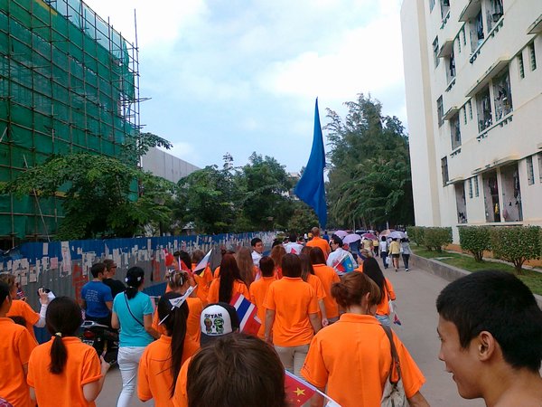 Team foreigner marching to the opening ceremony in our orange team shirts