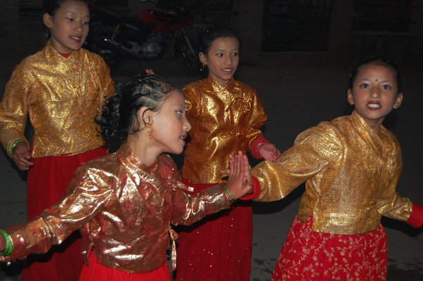 Girls singing and dancing in the streets