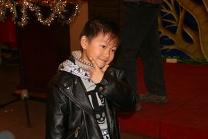 A kid posing during the fashion show!!