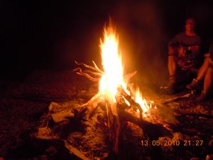 62. Drinks and music around the campfire