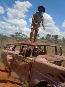 38. Having fun with one of the tour guides in an abandoned car in the outback!