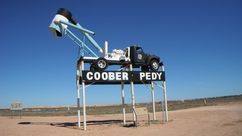 12. The Coober signpost with a mining dump truck!