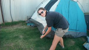 34. Me putting up an actual tent while camping!