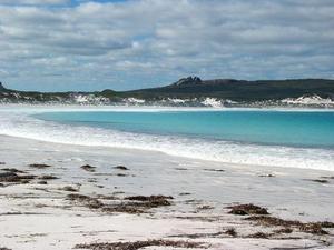 The beautiful white sand and turquoise water of lucky bay