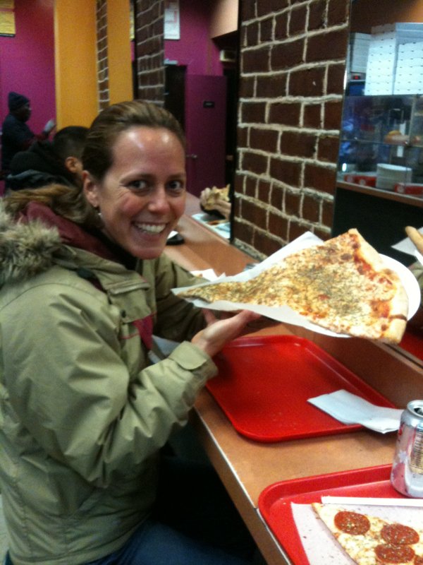 Trying a piece of New York pizza
