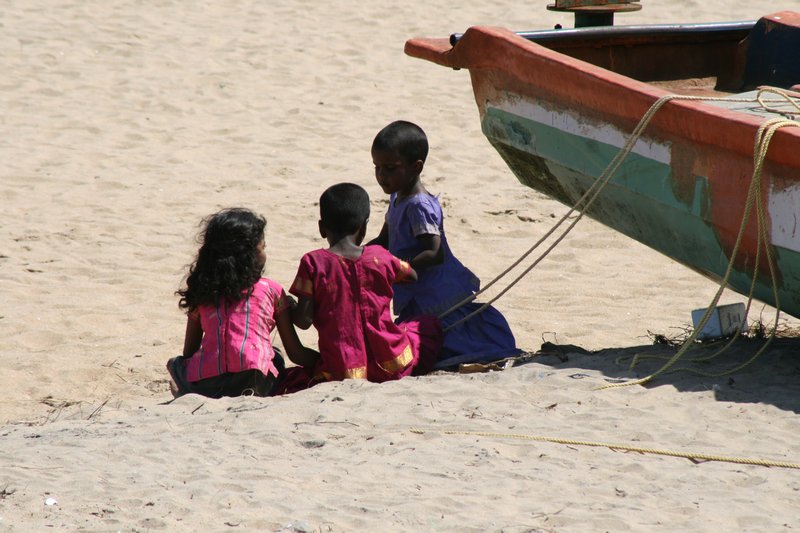 Kids playing on the beach Mamallapuram