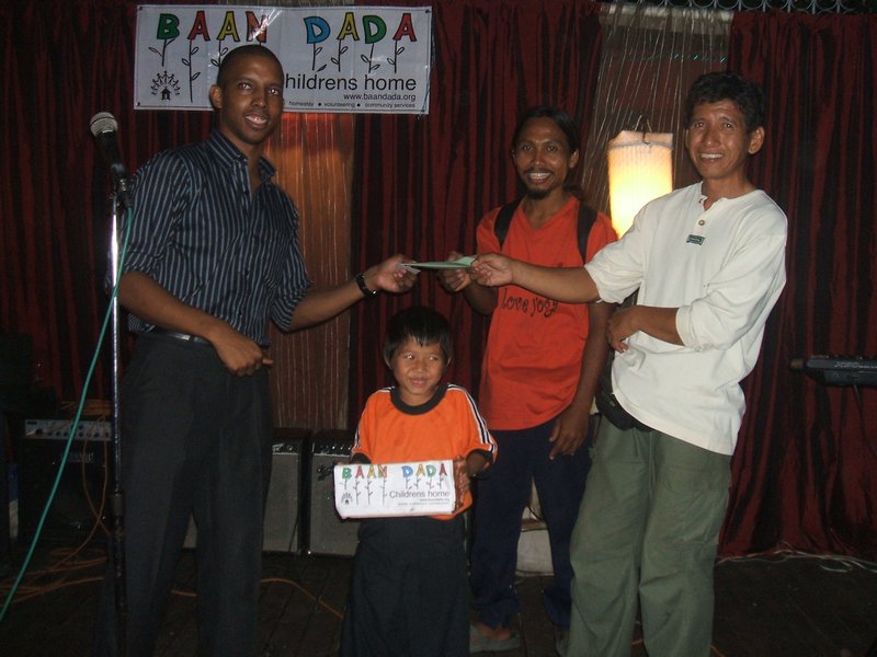 Receiving the cheque for the money we raised
