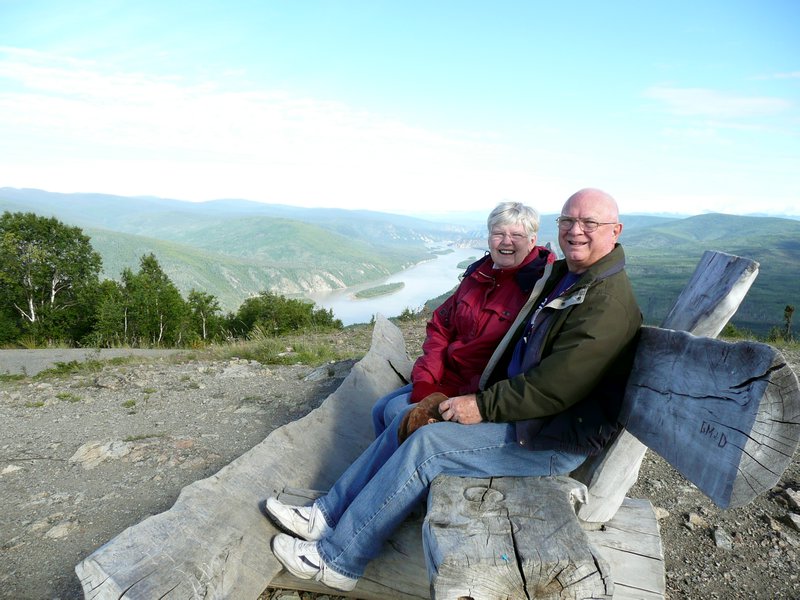 2011-08-08  Dwason City - Dwain & Lorraine at top of the Dome with Yukon River in background