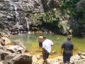 Going for a dip at Temurun waterfall