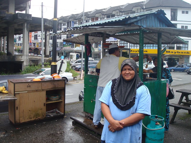 My friend Fatima in front of her family's food stand