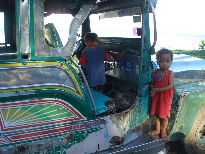 Kids playing on Jeepney