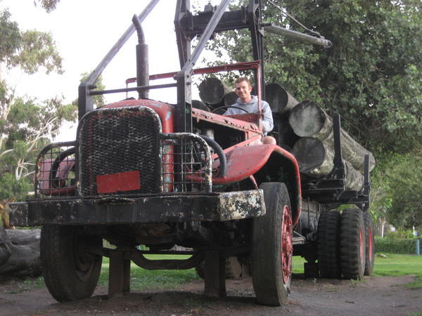 Joe driving an old logging truck