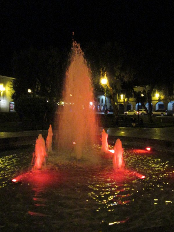 Cusco - Colour changing fountain at Plaza Regocijo