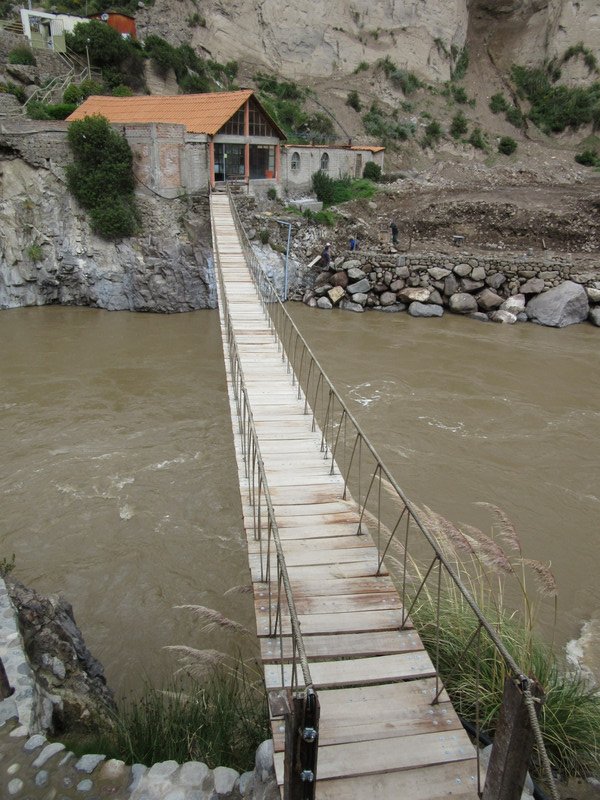 Bridge over the Rio Colca to the hot pools