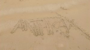 Another beach, another Anthrax logo scrawled in the sand