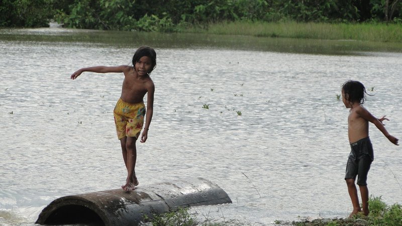 kids playing near river