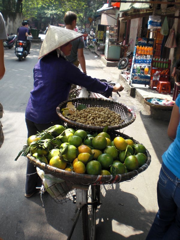 Lady selling fruit in Hanoi