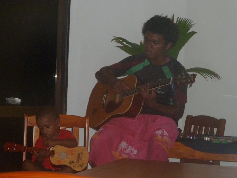 Ruben and his son entertaining us at dinner
