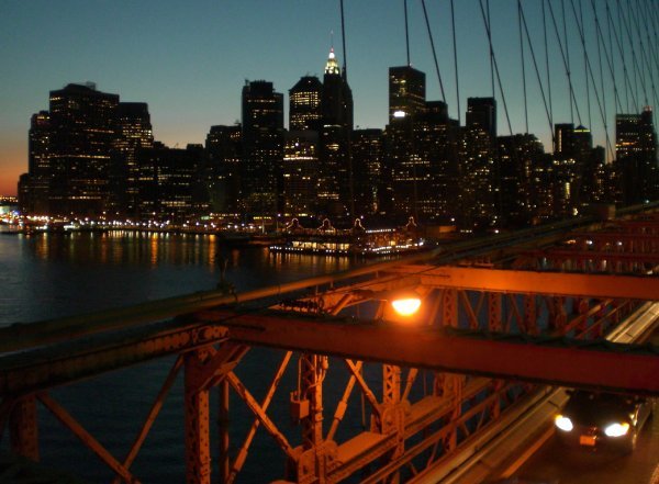A view of Lower Manhattan from Brooklyn Bridge after sunset 