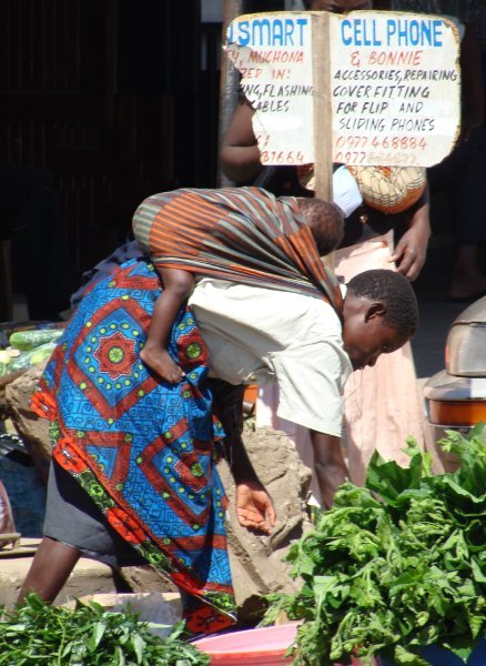 A mother with her baby on Livingstone market
