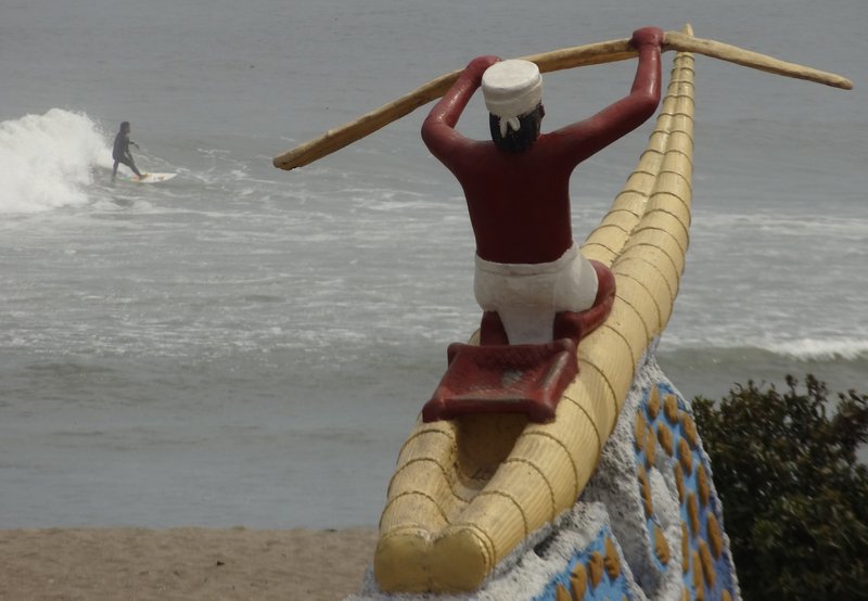 Surfer and sculpture, Huanchaco
