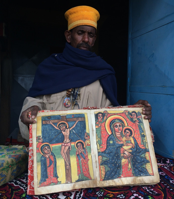 Monk holding a bible