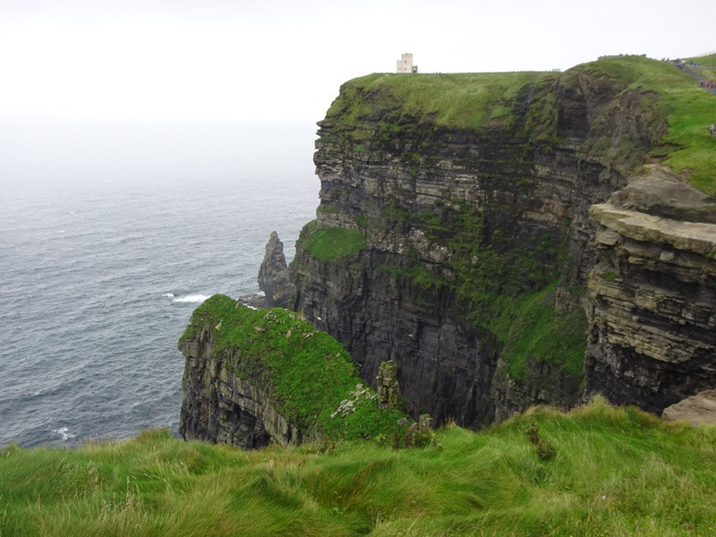 Cliffs of Moher. O'Brien's Tower. For scale, note that tower is 3 storeys. 