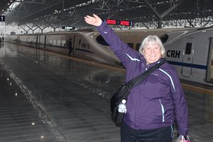 Vanna White shows off the bullet train, Yichang, China