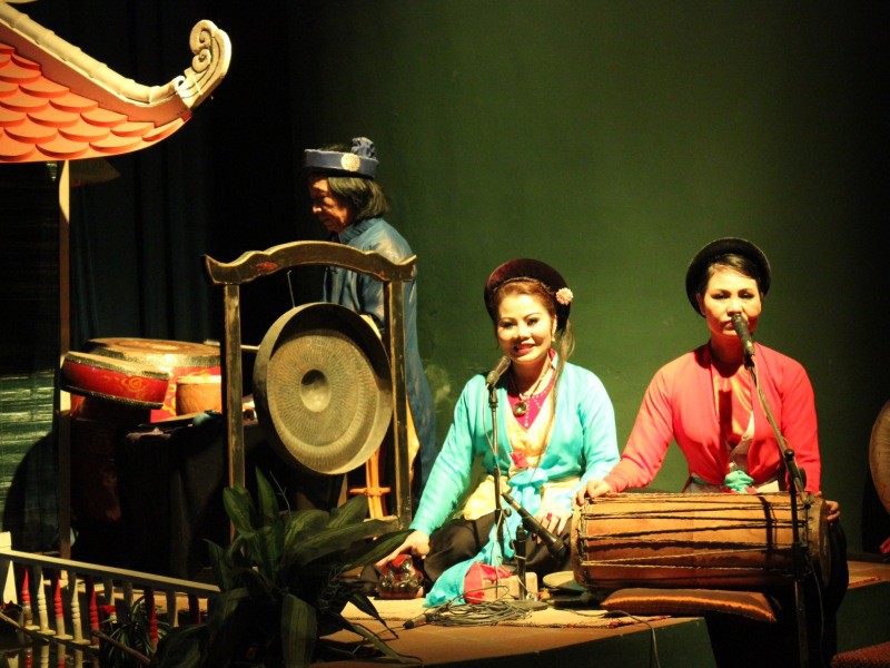 Musicians and singers at water puppet theatre, Hanoi