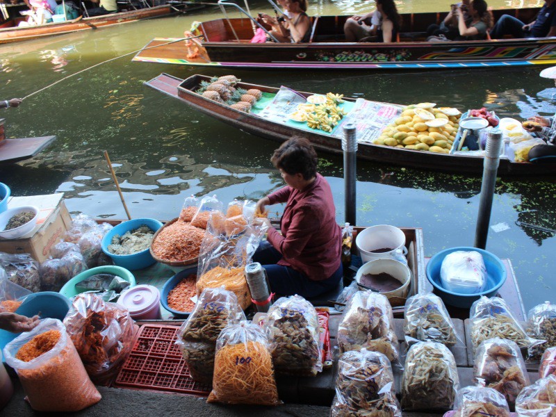 Goods for sale at Damnoen Saduak floating market, Thailand