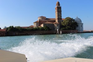 Speeding away from Venice in a water taxi