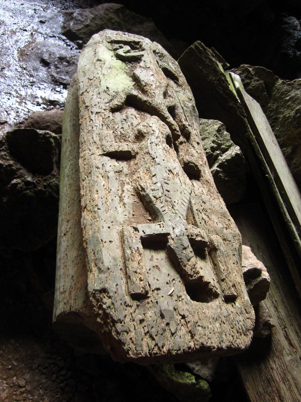 Coffin within the cave entrance. In Igorat, the lizard symbolizes long and healthy life.