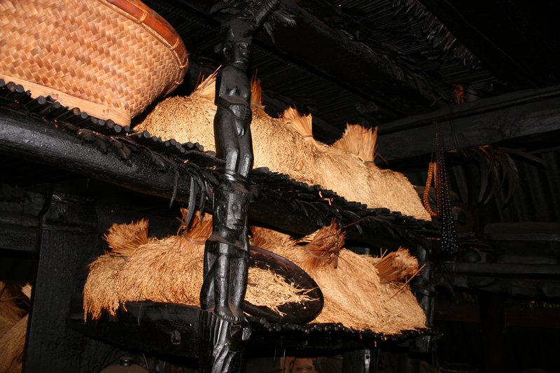 Drying rice bundles above the fire