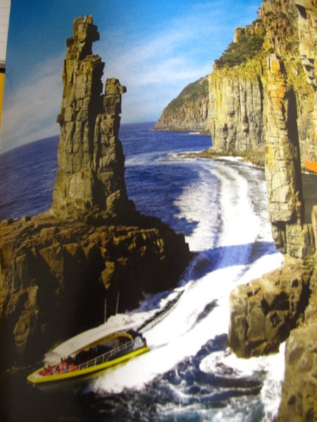 Boat speeding through the Monument and the cliffs - needed a long reach to get this photo ! 