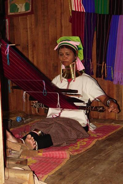 Longneck Lady Weaving At A Tourist Shop