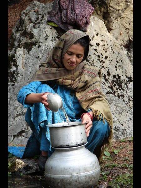 Gypsie Girl Collecting Water