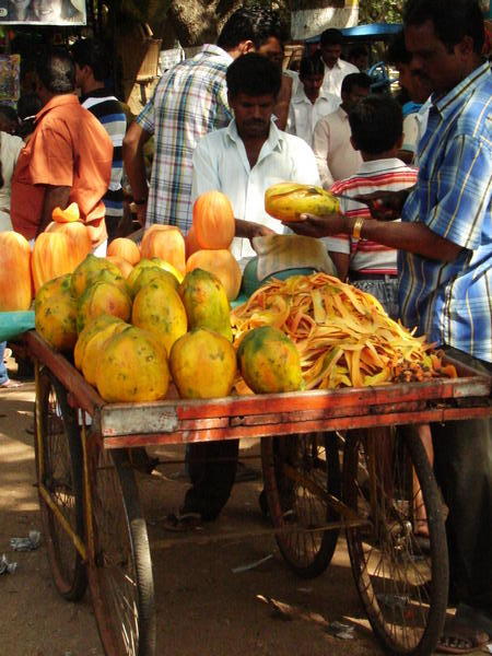 Street Vendor selling Papaya