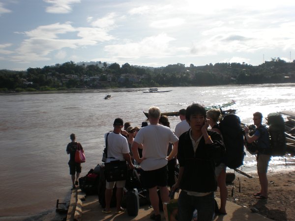 Hitchhiking across the river to Laos
