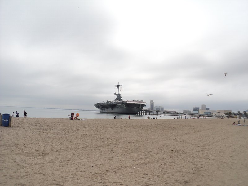 Corpus Christi Beach and aircraft carrier