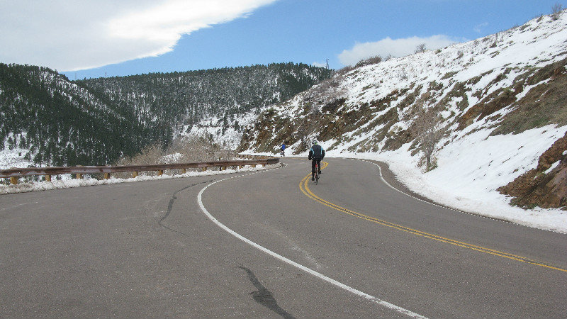 Bicyclist biking up the mountain