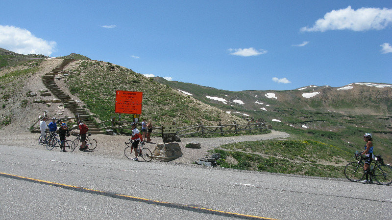 Bicyclist at the summit of Loveland Pass