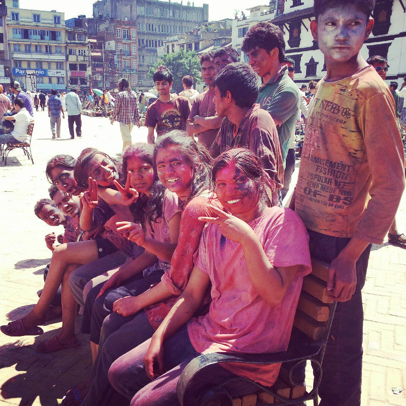 young locals enjoying holi