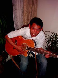 Trang on the guitar