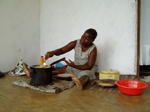 Mama cooking Chappatis